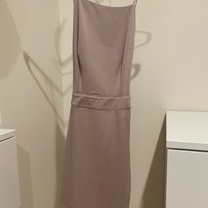 Tight Fitting by the way. Dress Tags Still On